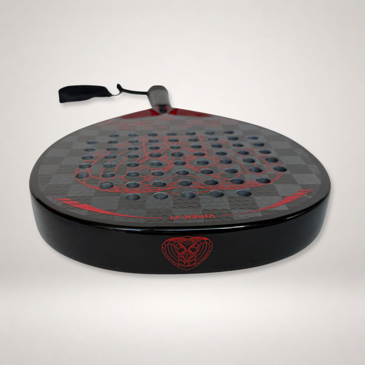 18K carbon and textured surface detail of Viper V1 racket